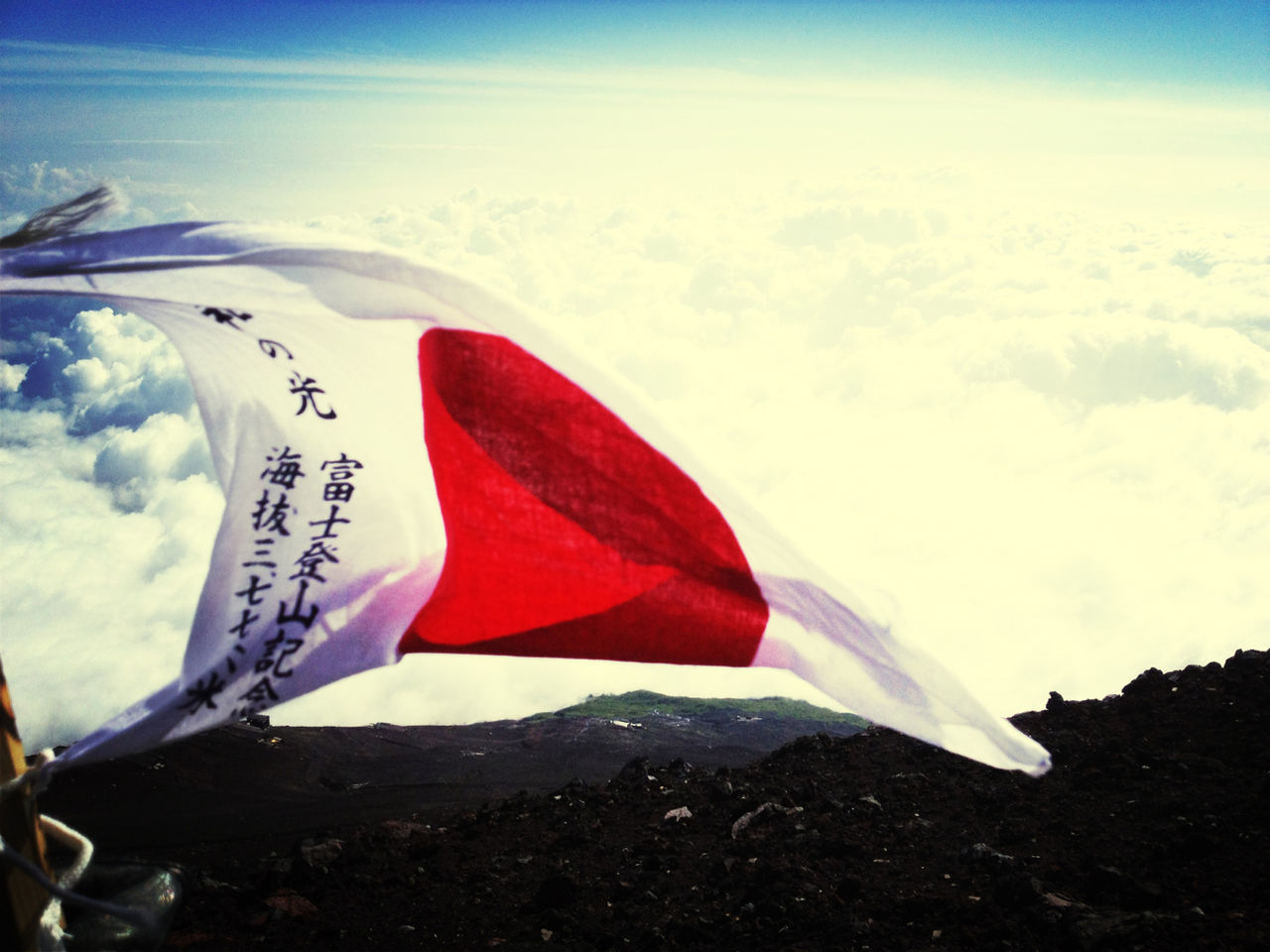 sky, flying, flag, white color, cloud - sky, identity, cloud, transportation, patriotism, nature, no people, outdoors, mid-air, day, beauty in nature, close-up, part of, wind, sunlight, mode of transport