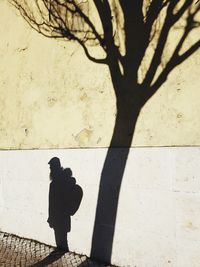 High angle view of people standing on footpath