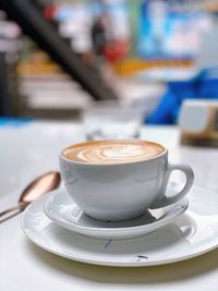 Close-up of coffee served on table