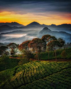 Scenic view of mountains against sky during sunset