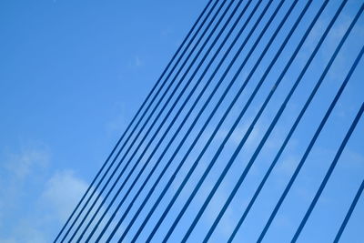Low angle view of metallic structure against sky