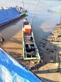 High angle view of boat moored on beach