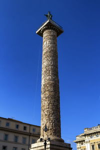 Triumphal trajan's column by day, rome, italy