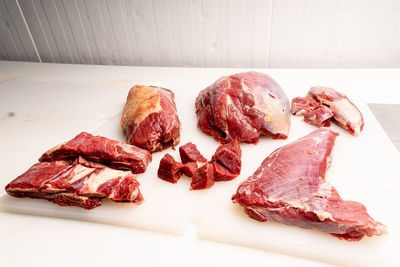 Close-up of meat on cutting board