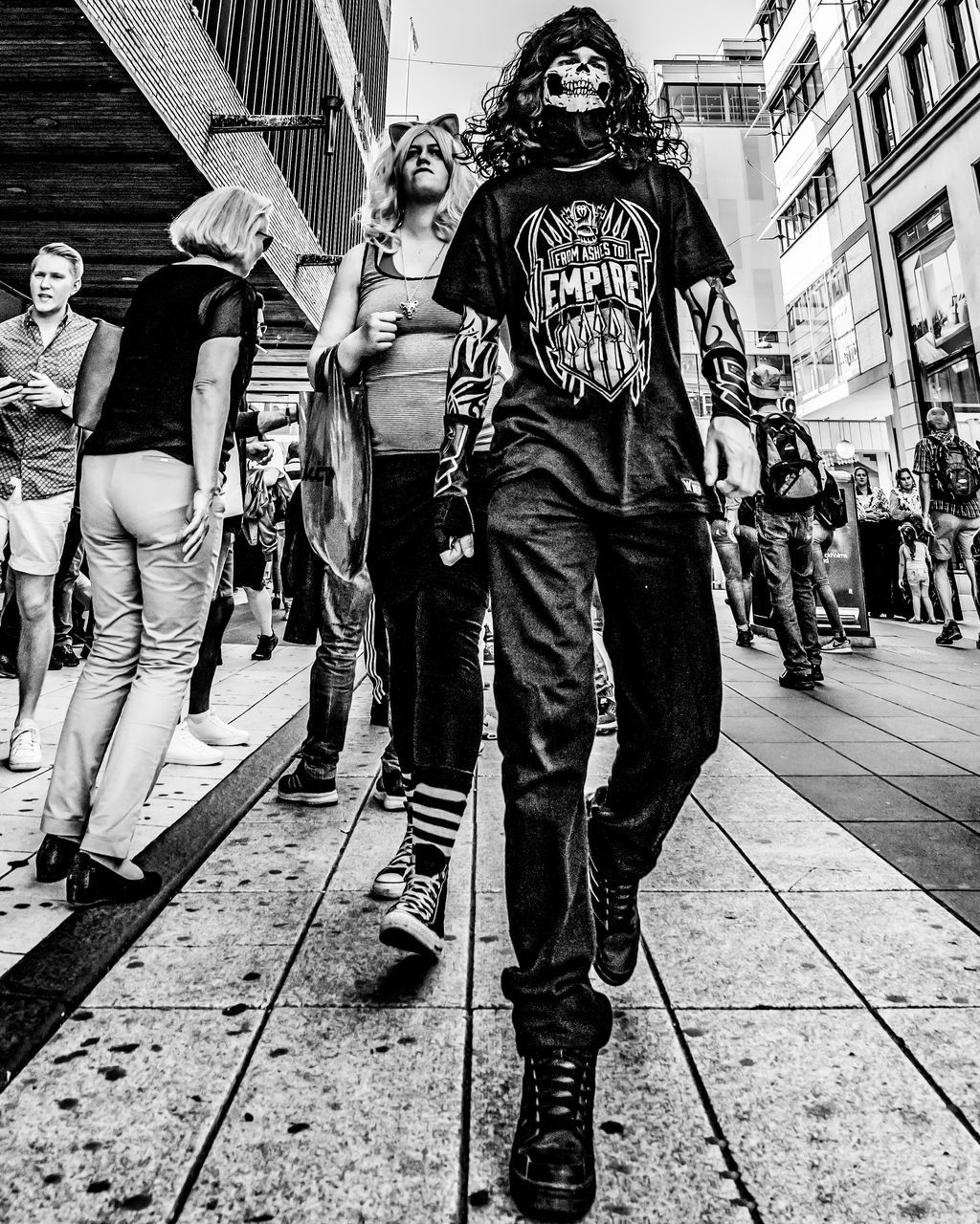 city, group of people, real people, street, architecture, full length, walking, building exterior, people, day, standing, lifestyles, men, women, built structure, clothing, adult, leisure activity, city life, footpath, outdoors