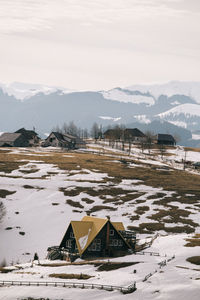 Scenic view of snow covered field