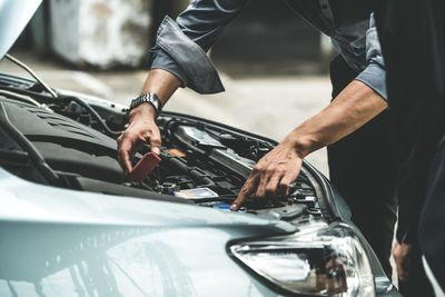 Man taking selfie in car