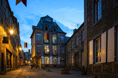Old street in the town of dinan at dusk