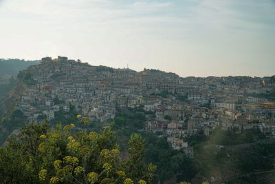 High angle view of townscape against sky in city