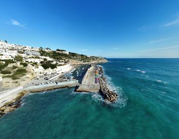 Scenic view of sea against blue sky