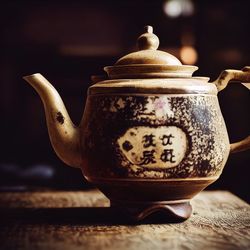 Close-up of teapot on table