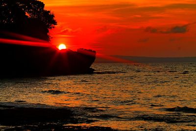 Scenic view of sea at sunset