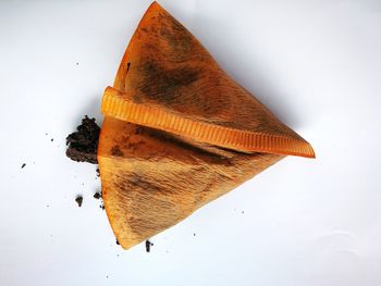 Close-up of chocolate cake against white background