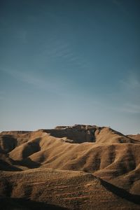 Scenic view of desert against sky