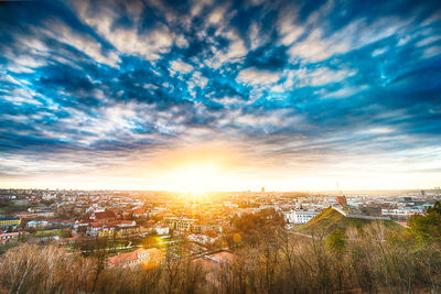 High angle view of buildings against sky during sunset