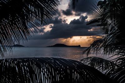 Scenic view of sea against sky at sunset