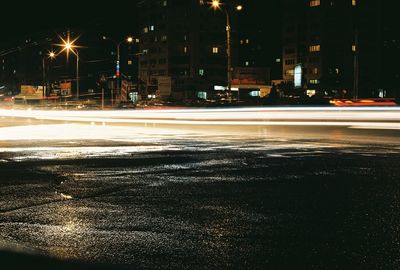 Light trails on city street at night