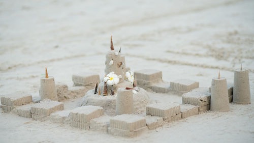 High angle view of sandcastle at beach