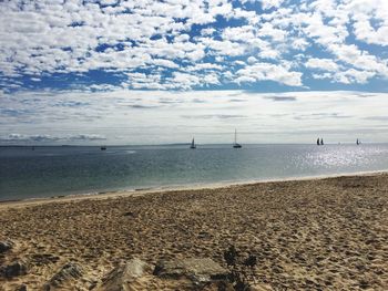 Scenic view of beach against sky