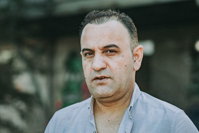 Portrait of man wearing hat outdoors