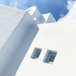 Low angle view of white building against sky