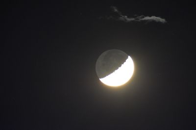 Low angle view of moon against sky at night