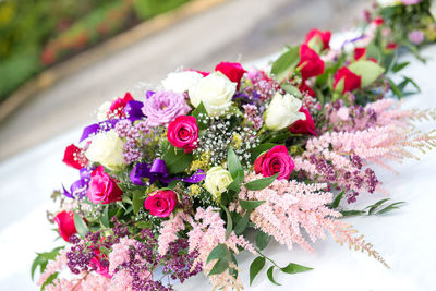 Close-up of flower decoration on wedding car
