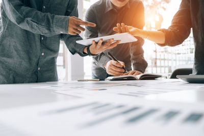 Group of people working on table