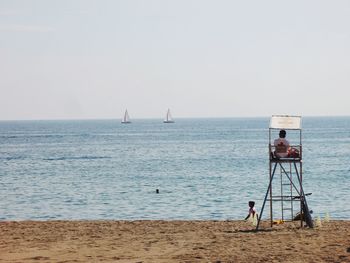 Scenic view of sea against clear sky