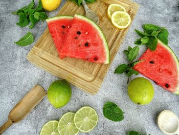 High angle view of chopped fruits on cutting board