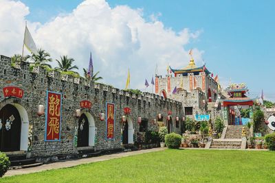 Temple against cloudy sky