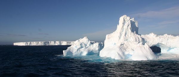 Scenic view of frozen sea against sky