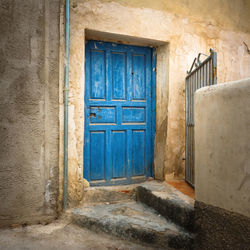 Closed door of abandoned house