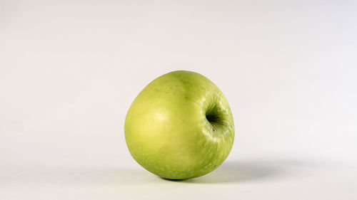Close-up of apple against white background