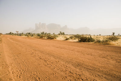 Scenic view of desert landscape against sky