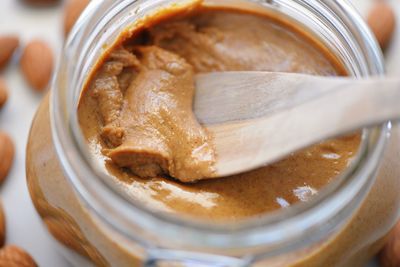 High angle view of butter in jar