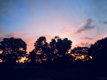 Scenic view of landscape at sunset