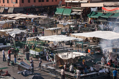 High angle view of people at market in city