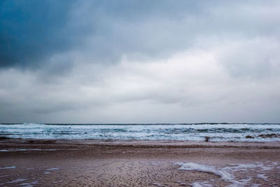 Scenic view of beach against sky