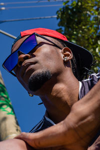 Portrait of young man wearing sunglasses