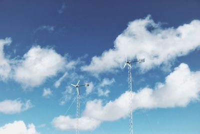 Low angle view of sails against sky