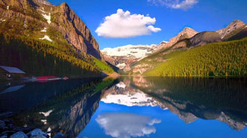 Scenic view of lake and mountains against sky,canmore,canada