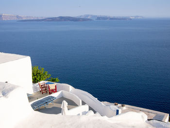 High angle view of swimming pool by sea against sky