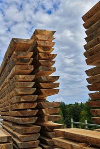 Stack of temple against cloudy sky