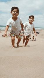 My beautiful twin children playing on the shores of my beautiful argentina