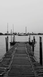 Pier over sea against clear sky