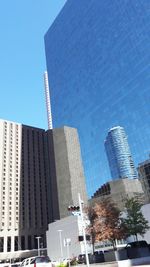 Low angle view of skyscrapers against sky