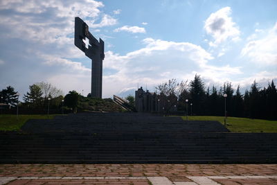 Low angle view of stone structure against sky