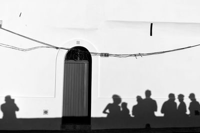 Shadow of people on building