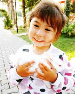 Portrait of smiling boy in park